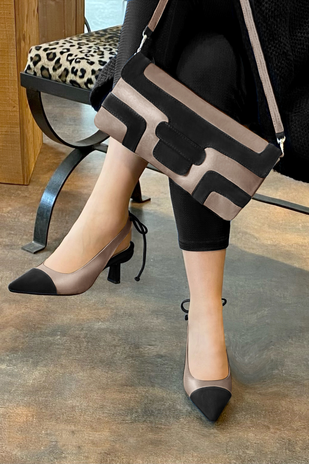 Matt black and tan beige women's slingback shoes. Pointed toe. Medium spool heels. Worn view - Florence KOOIJMAN